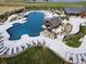 Expansive pool area with lounge chairs and cabana at 3010 Newfound Lake Rd, Berthoud, CO 80513