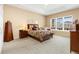 Spacious main bedroom with ample natural light and carpet flooring at 4640 Belford Cir, Broomfield, CO 80023