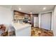 Updated kitchen featuring stainless steel appliances and breakfast bar at 100 Park W Ave # 608, Denver, CO 80205