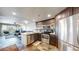 Modern kitchen with stainless steel appliances and an island at 100 Park W Ave # 608, Denver, CO 80205