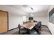 Modern conference room, well-lit, with a long table and chairs at 100 Park W Ave # 608, Denver, CO 80205