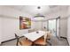 Bright and airy conference room with a large table at 100 Park W Ave # 608, Denver, CO 80205