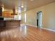 Spacious kitchen with hardwood floors and island at 230 Emery St, Longmont, CO 80501