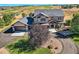 Luxury home with circular driveway and large yard at 1348 Chapel Royal Ct, Monument, CO 80132