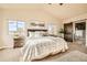 Main bedroom with vaulted ceiling, large windows and mountain views at 1348 Chapel Royal Ct, Monument, CO 80132