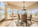 Breakfast nook with scenic views and French doors leading to deck at 1348 Chapel Royal Ct, Monument, CO 80132