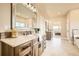 Luxurious bathroom with double vanity and soaking tub at 1348 Chapel Royal Ct, Monument, CO 80132