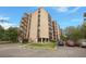 Building exterior view with ample parking at 3465 S Poplar St # 308, Denver, CO 80224