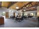 Community room with tables, chairs, and a pool table at 3465 S Poplar St # 308, Denver, CO 80224