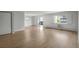Living room with hardwood floors and access to balcony at 3465 S Poplar St # 308, Denver, CO 80224