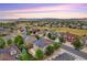 Aerial view of neighborhood with houses and landscaping at 2355 Woodhouse Ln, Castle Rock, CO 80109