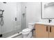 Stylish bathroom with a walk-in shower and modern vanity at 930 S Clayton Way, Denver, CO 80209