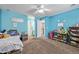 bedroom with a twin bed, bookcase, and toys at 11533 Dahlia St, Thornton, CO 80233