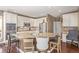 Large kitchen island with granite countertops and seating for four at 11533 Dahlia St, Thornton, CO 80233