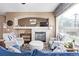Gathering room with fireplace and comfortable seating at 11533 Dahlia St, Thornton, CO 80233