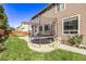 Large backyard with a trampoline and patio area at 11533 Dahlia St, Thornton, CO 80233