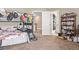 bedroom with a bunk bed and a bookcase at 11533 Dahlia St, Thornton, CO 80233