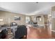 Spacious living room with hardwood floors and a dining area at 11533 Dahlia St, Thornton, CO 80233
