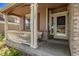 Inviting front porch with seating and a view of the front yard at 11533 Dahlia St, Thornton, CO 80233