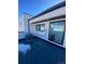 Private rooftop deck with composite decking and city views at 1254 Yates St, Denver, CO 80204