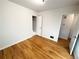 Spacious bedroom with hardwood floors and access to a closet at 3230 S Ogden St, Englewood, CO 80113