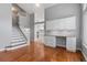 Open living room showcasing hardwood floors and staircase at 19058 E Bonney Ct, Parker, CO 80134