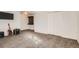 Finished basement with built-in bar and closet at 2605 W Cornell Ave, Denver, CO 80236