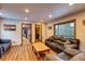 Living room with leather couches and wood coffee table at 537 Moonstone Rd, Breckenridge, CO 80424