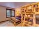 Bedroom with bunk bed and a full-size bed at 537 Moonstone Rd, Breckenridge, CO 80424