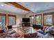 Spacious game room with leather couches and mountain views at 537 Moonstone Rd, Breckenridge, CO 80424