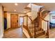 Bright entryway with wood staircase and hardwood floors at 537 Moonstone Rd, Breckenridge, CO 80424