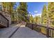 Spacious deck with mountain views and wooden railings at 537 Moonstone Rd, Breckenridge, CO 80424