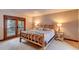 Bedroom with king-size bed and private balcony access at 537 Moonstone Rd, Breckenridge, CO 80424
