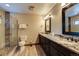 Elegant bathroom with granite countertop and walk-in shower at 537 Moonstone Rd, Breckenridge, CO 80424