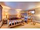 Bedroom with full-size bed and bunk beds at 537 Moonstone Rd, Breckenridge, CO 80424