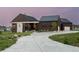 Modern farmhouse with long driveway and attached garage at 11229 Running Kit Pl, Franktown, CO 80116