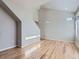 Living room with hardwood floors, high ceilings, and large windows at 2514 Sweet Wind Ave, Castle Rock, CO 80109