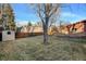 Backyard with shed and wooden fence at 5001 E Iliff Ave, Denver, CO 80222