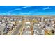 Aerial view of a residential community with houses, streets, and open space at 224 S Old Hammer St, Aurora, CO 80018