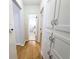 Clean hallway with hardwood floors and built in storage at 2180 S Logan St, Denver, CO 80210