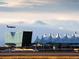 Denver International Airport with a plane overhead at 19877 E 40Th Ave, Denver, CO 80249