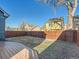 Backyard with deck and partial view of neighboring homes at 7816 Elmwood St, Littleton, CO 80125