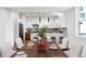 Bright dining area with wood table and seating for six at 1420 Pierce St, Lakewood, CO 80214