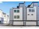 Modern building exterior with attached garages at 1420 Pierce St, Lakewood, CO 80214