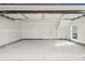 Unfinished garage with extra storage space at 1420 Pierce St, Lakewood, CO 80214