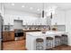 Modern kitchen with stainless steel appliances and an island at 1420 Pierce St, Lakewood, CO 80214
