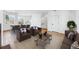 Open living area with a dining and sitting area at 1420 Pierce St, Lakewood, CO 80214
