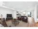Open concept living room with kitchen and dining area at 1420 Pierce St, Lakewood, CO 80214