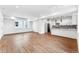 Bright and spacious living area with hardwood floors and kitchen at 1420 Pierce St, Lakewood, CO 80214