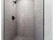 Clean and spacious shower with gray tile at 1420 Pierce St, Lakewood, CO 80214